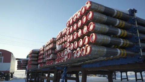 Drill pipes in front of the drilling station, day Stock Footage 143315342