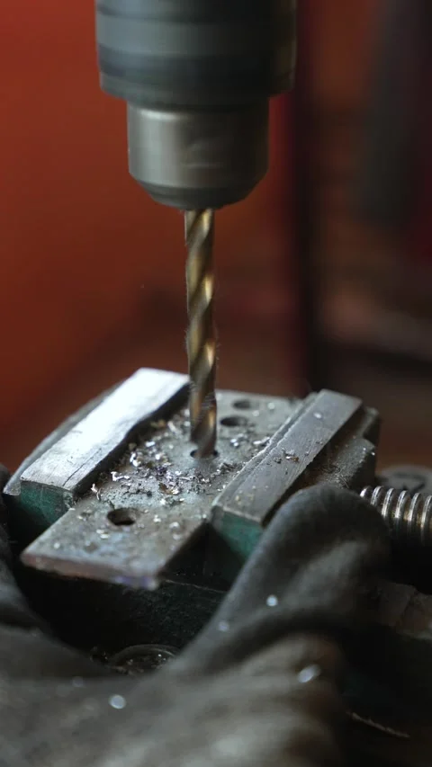 Drill Press Drilling into Metal with Precision Stock Footage 308829060