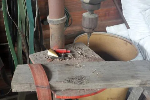 Drill Press in workshop with old tools Stock Photos