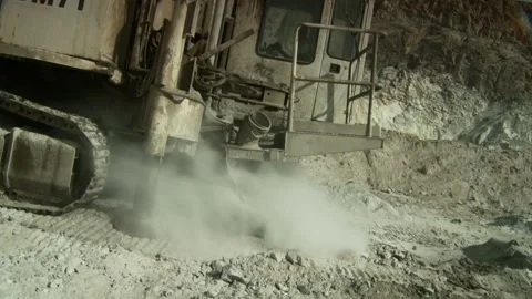 A drill rig drilling on an opencast mine Stock Footage 312400421