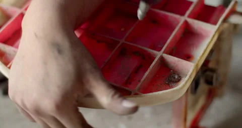 Drill the rusty nut head to remove the damaged nut.Remove old, rusted nuts. Stock Footage 282381757