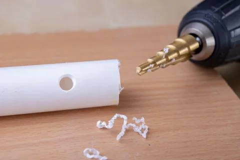 Drill in the shape of a cone for quick drilling. Accessories for mechanics. Stock Photos