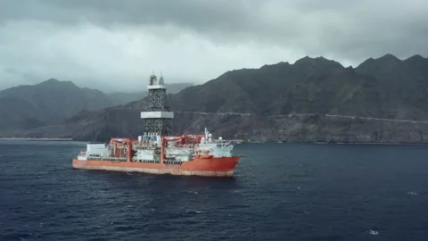 Drill ship during exploration and drilling of oil and natural gas in sea waters Video stock 130416884