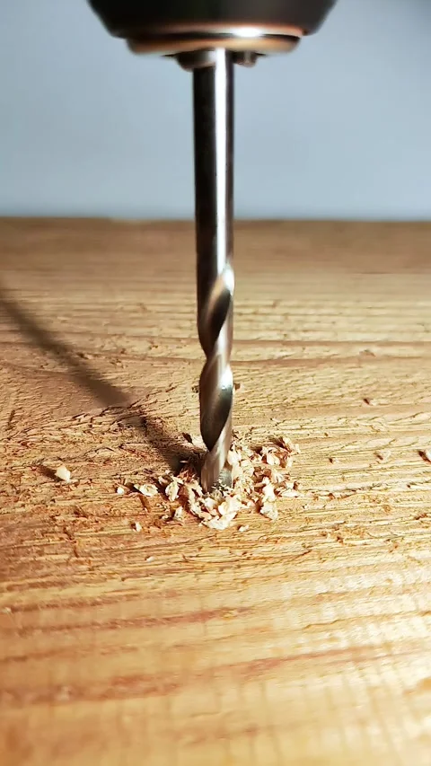 Drill in wood Stock Footage 311858882