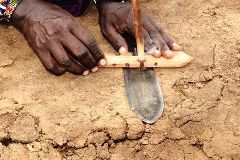 Drill wood to make fire Stock Photos