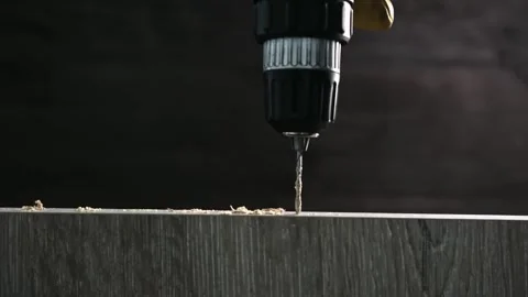Drill Working on a Wooden Surface in a Workshop Setting Stock Footage 341575956