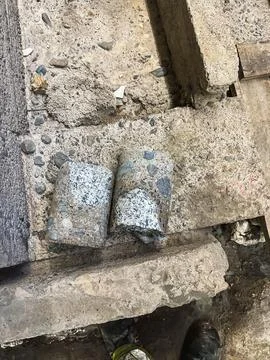 Drilled concrete core sample used for inspection of concrete structure.. Stock Photos