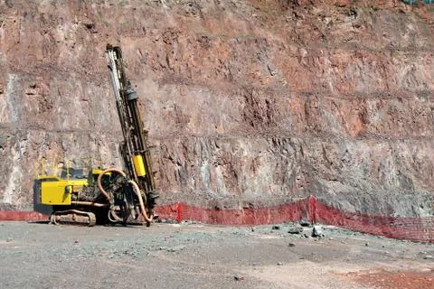 Driller in an open pit mine Stock Photos