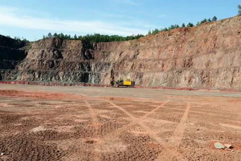 Driller in an open pit mine Stock Photos
