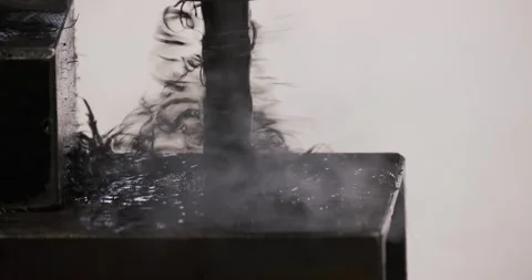 Drilling and milling CNC in workshop. Professional skilled metal work factory Stock Footage 167976514