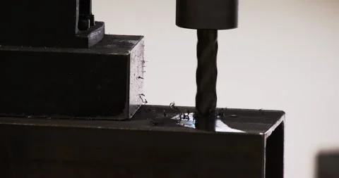 Drilling and milling CNC in workshop. Professional skilled metal work factory Stock Footage 168414590