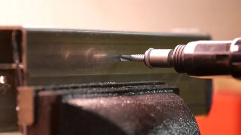 Drilling into angle iron Stock Footage
