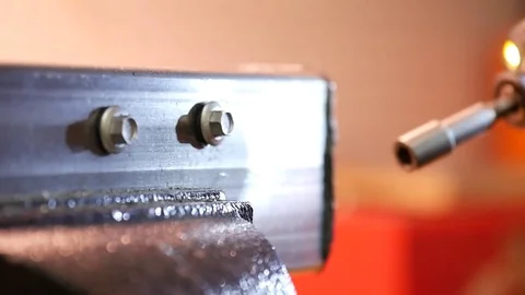 Drilling into angle iron Stock Footage 77812833