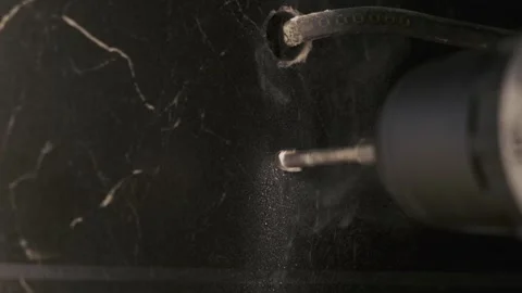 Drilling ceramic tile. Carpentry workshop with drill bit and turn spiral drill Stock Footage 247206249