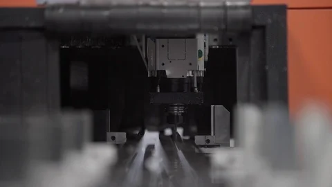 Drilling CNC Machine processes the aluminium profile. Modern tool in heavy Stock Footage 121356447