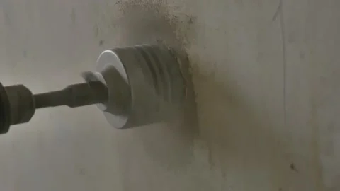 Drilling a Concrete Wall to Install Power Outlet in Wall 動画素材 168437306