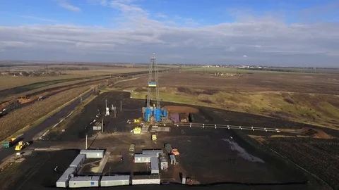 Drilling derrick on the gas field Stock Footage 80719419
