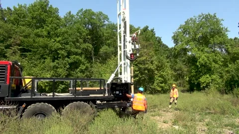 Drilling an exploration well with a drill pipe mounted on URB 2A2 rotator. Video stock 156386199