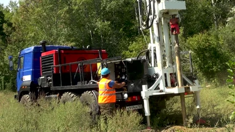 Drilling an exploration well with a drill pipe mounted on URB 2A2 rotator. Stock Footage 156544220