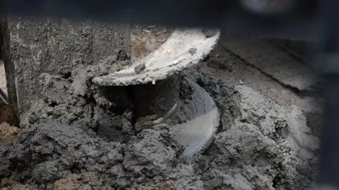 Drilling a foundation well with a crawler drill. Wetland, mud and clay as t.. Stock Footage 231704476