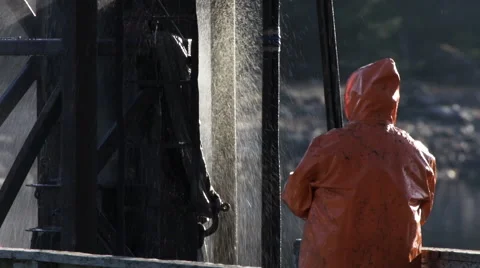 Drilling Fracking Pile Driving Derrick Rig with Worker and Spray Stock Footage 58719247