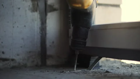 Drilling a hole and installing the window frame Stock Footage 274720421