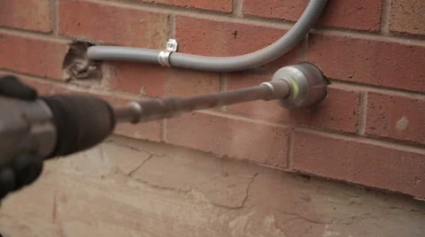 Drilling Hole into Brick Wall. Stock Footage 58192870