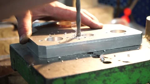 Drilling a hole with a drilling machine Stock Footage 137392571