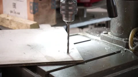 Drilling a hole with a drilling machine Video stock 137392719