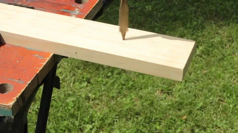 Drilling a hole Stock Footage 24917424