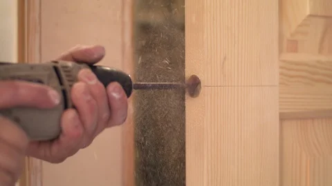 Drilling hole for a lock Video stock 94931832