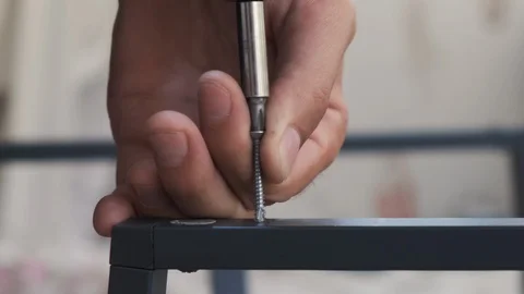 Drilling a hole with a screw Stock Footage 111441379