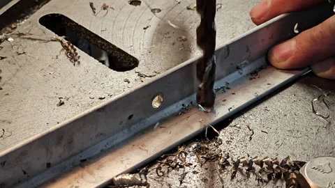 Drilling a hole in a steel profile. Stock Footage 328246306