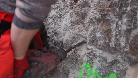 Drilling hole into stone with a driller Stock Footage 271618072