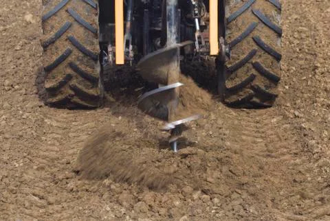 Drilling Hole with Tractor Stock Photos
