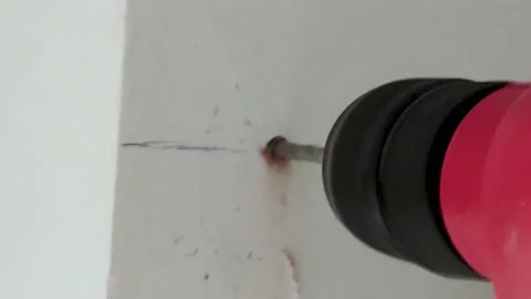 Drilling a Hole on the Wall for Construction. Stock Footage 221652456