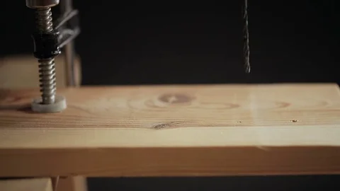 Drilling a hole in wood plank Stock Footage 72197220