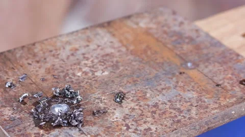 Drilling holes in metal workpiece using jigsaw Stock Footage 50690711