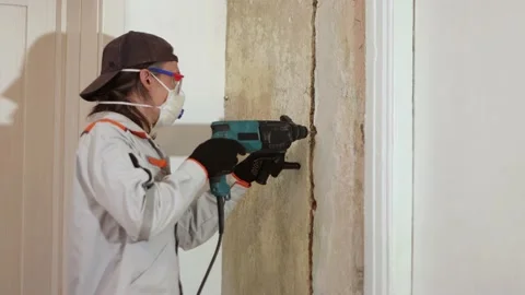 Drilling holes in the wall for cable routing. Видео 219948563