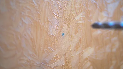 Drilling holes in the wall drill Stock Footage 72936417