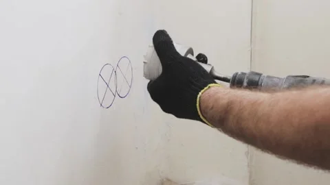 Drilling holes in the wall Stock Footage 147172880