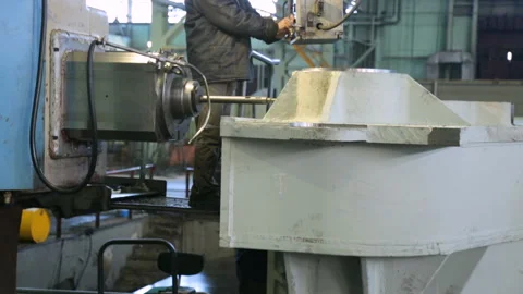 Drilling holes in workpiece on machine Stockbeeldmateriaal 100497235