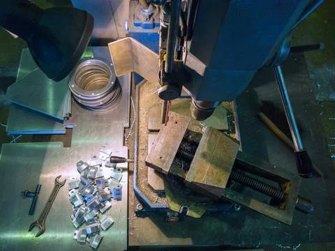 Drilling locksmith workplace with old dirty vertical drilling machine Фото