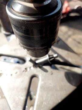 Drilling Machine Chuck Close-Up in Workshop Setting During Work Process Stock Photos