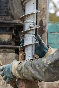 Drilling machine for drilling holes in the ground Stock-Fotos