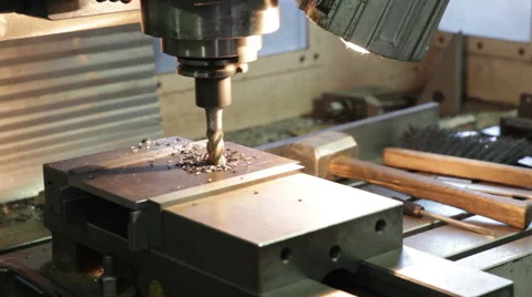Drilling machine making a hole in a steel bar Video stock 61941382