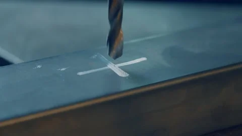 Drilling Machine processes the metal. Cut a hole close-up center Stock Footage 130755831
