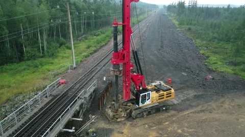 Drilling machine works. Aerial 4K Stock Footage 236402148