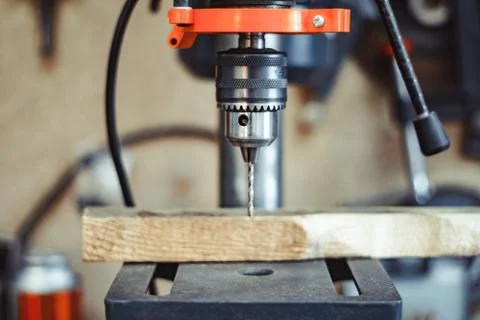 Drilling machine in the workshop Photos