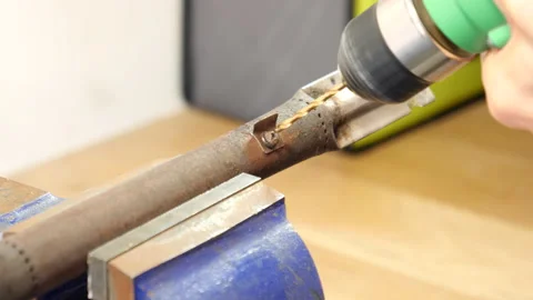Drilling out a rusty screw - with good sound 4K Видео 130509717